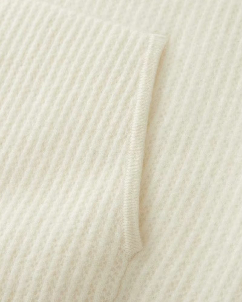 FELPA CON ZIP A COSTE IN MERINO
